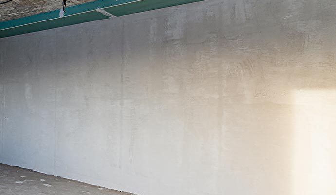Covered concrete wall