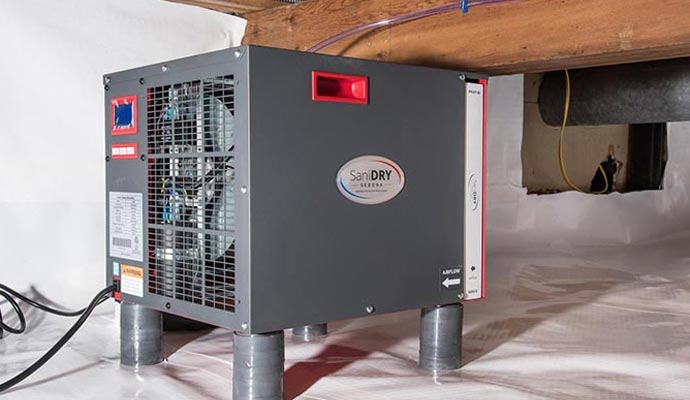 Dehumidifier installed in a residential crawl space
