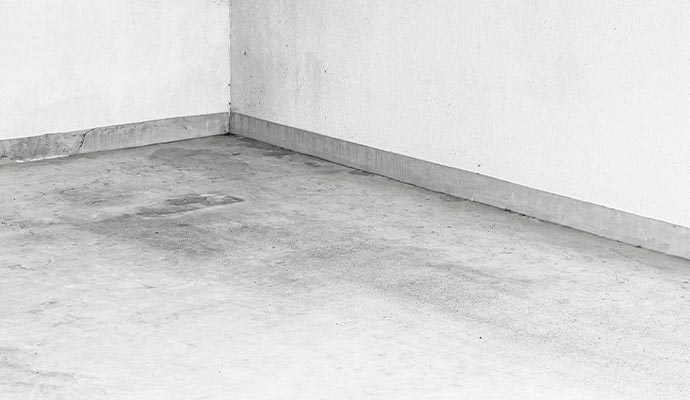 Concrete foundation floor with drain near the wall