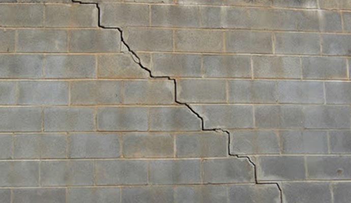Cracked concrete wall