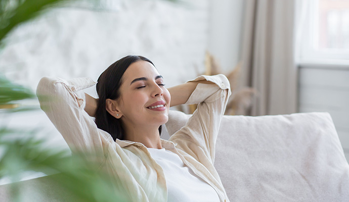 Woman relaxing on sofa