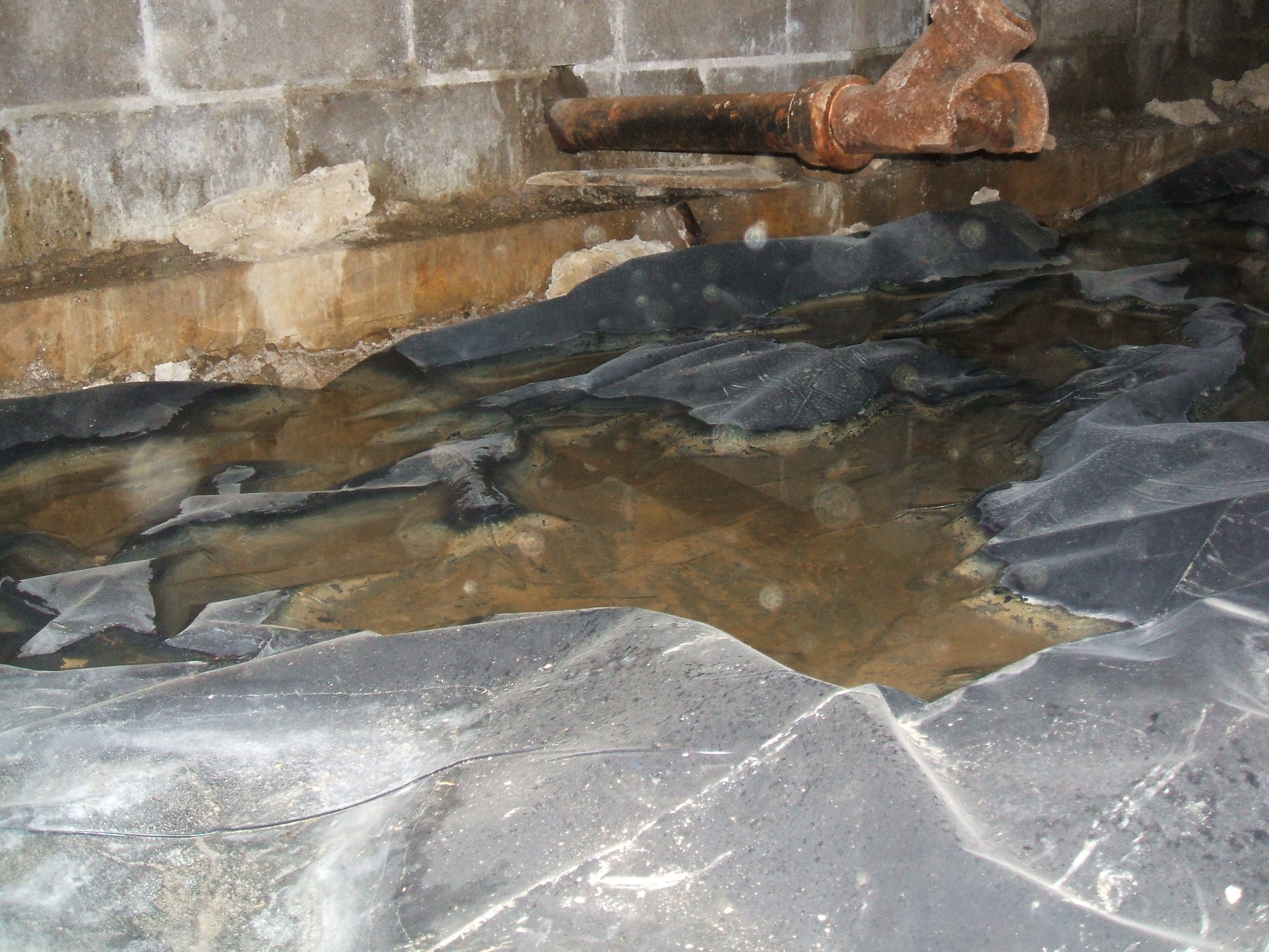 Crawl space with standing water