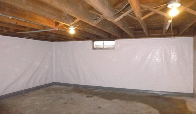Moisture Control in a basement through Vapor Barrier