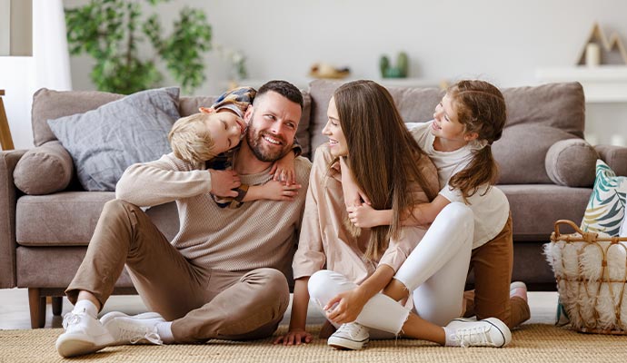 Happy family enjoying imrpoved air quality Happy family enjoying imrpoved air quality