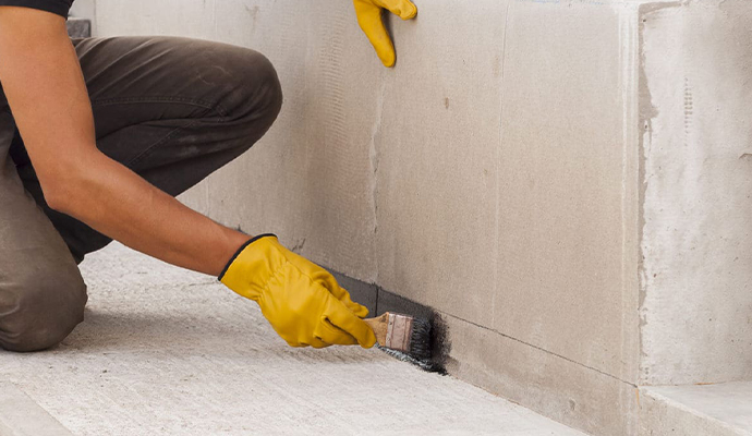 Repair work being done on a residential foundation.