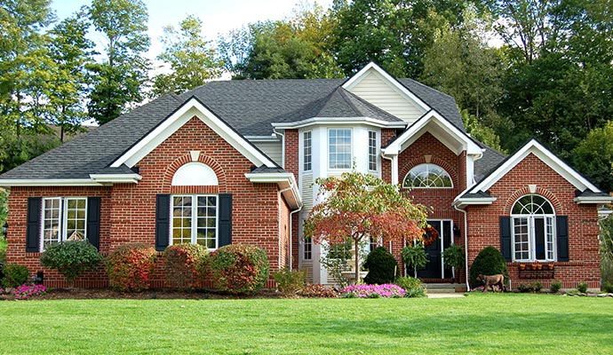 Beautiful home exterior with landscaped yard