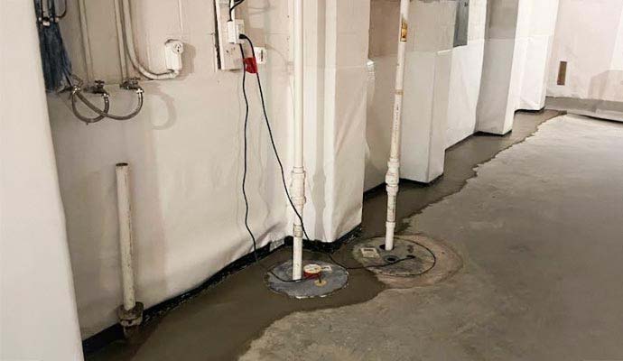 Sump pump system installed in basement
