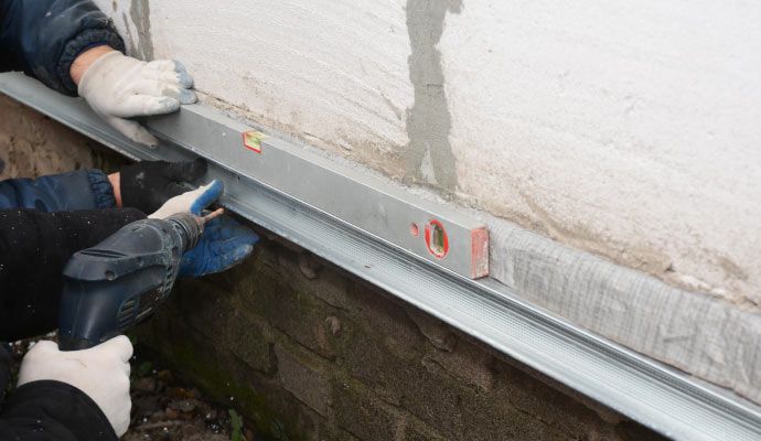 Foundation wall repair in progress
