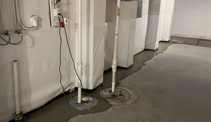 Installed sump pump in basement area