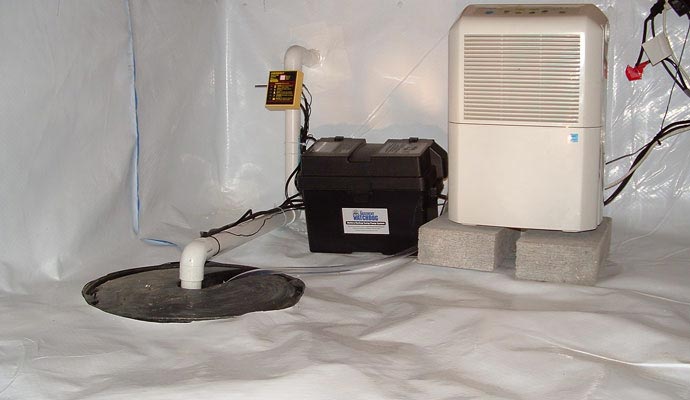 Installed sump pump in crawl space