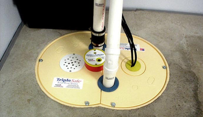 Installed Triple Safe sump pump system with sealed lid Installed Triple Safe sump pump system with sealed lid